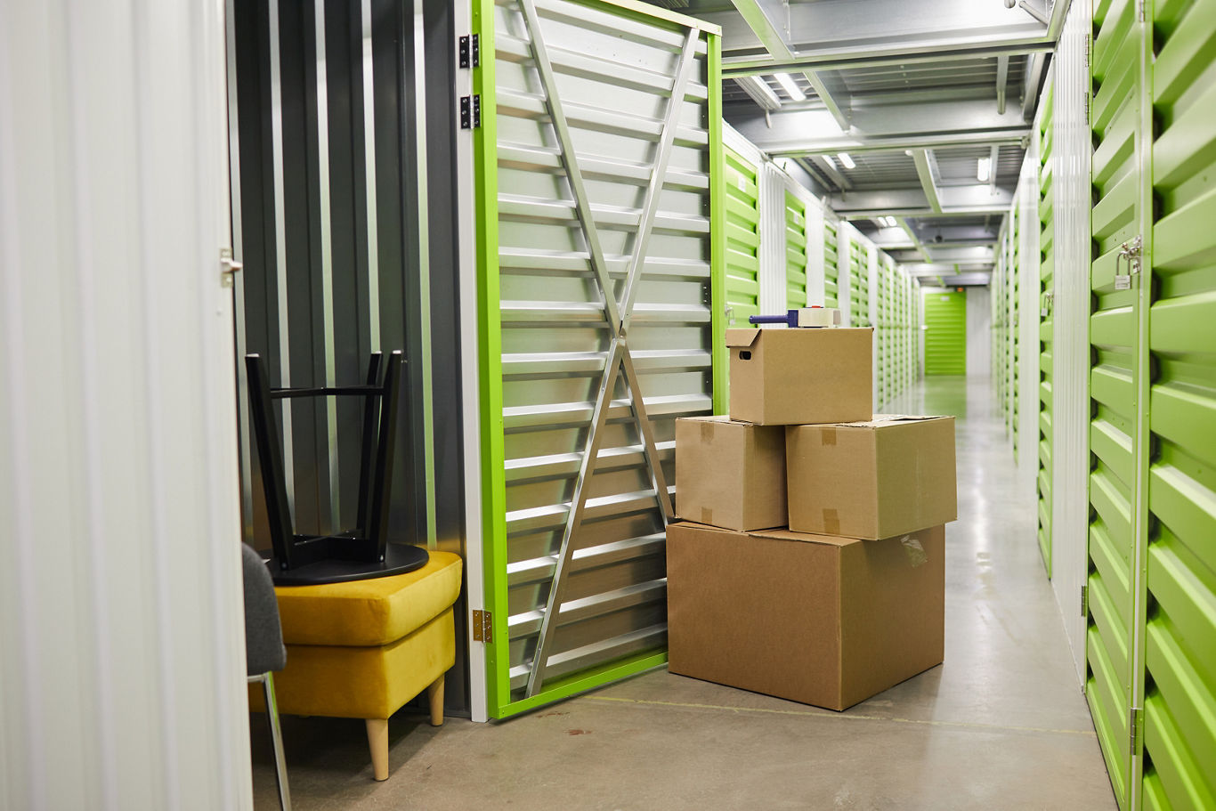 Storage Unit with Boxes Stacked Outside | Blog | Greystar